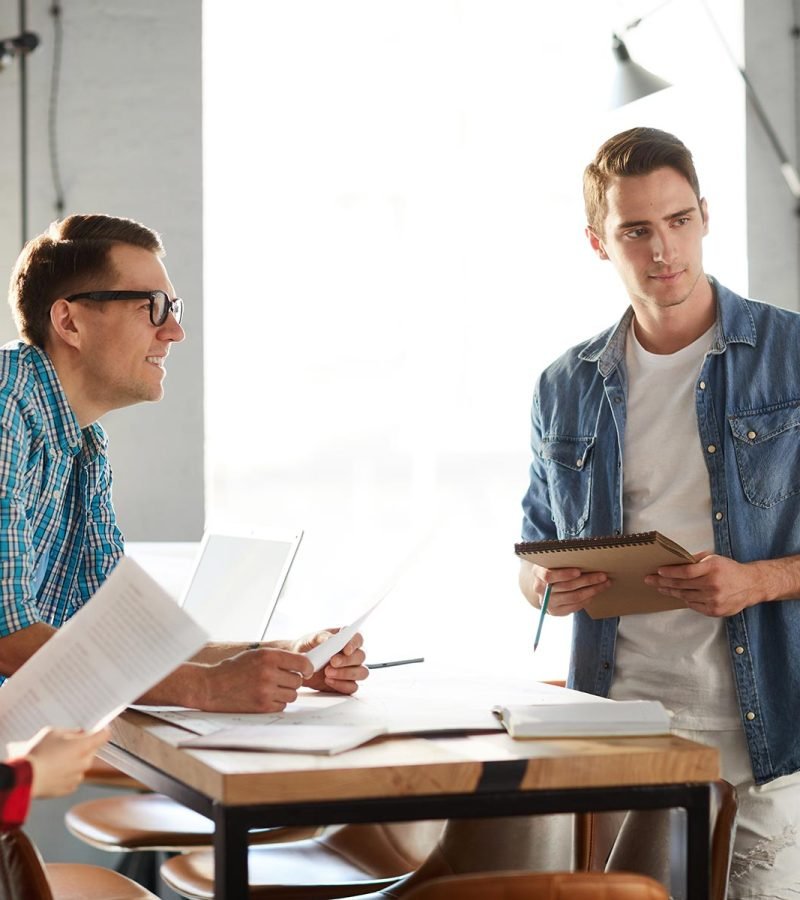 business-meeting-in-modern-office-Y893MZ5.jpg